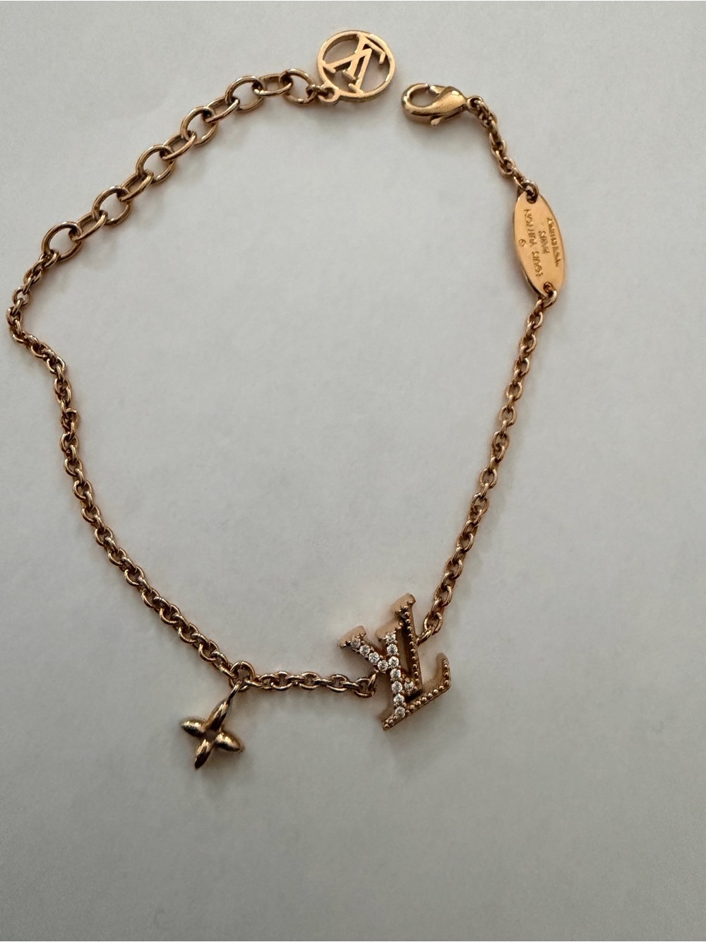 Authentic Louis Vuitton Gold Tone Crystal LV Charm Bracelet Monogram Flower